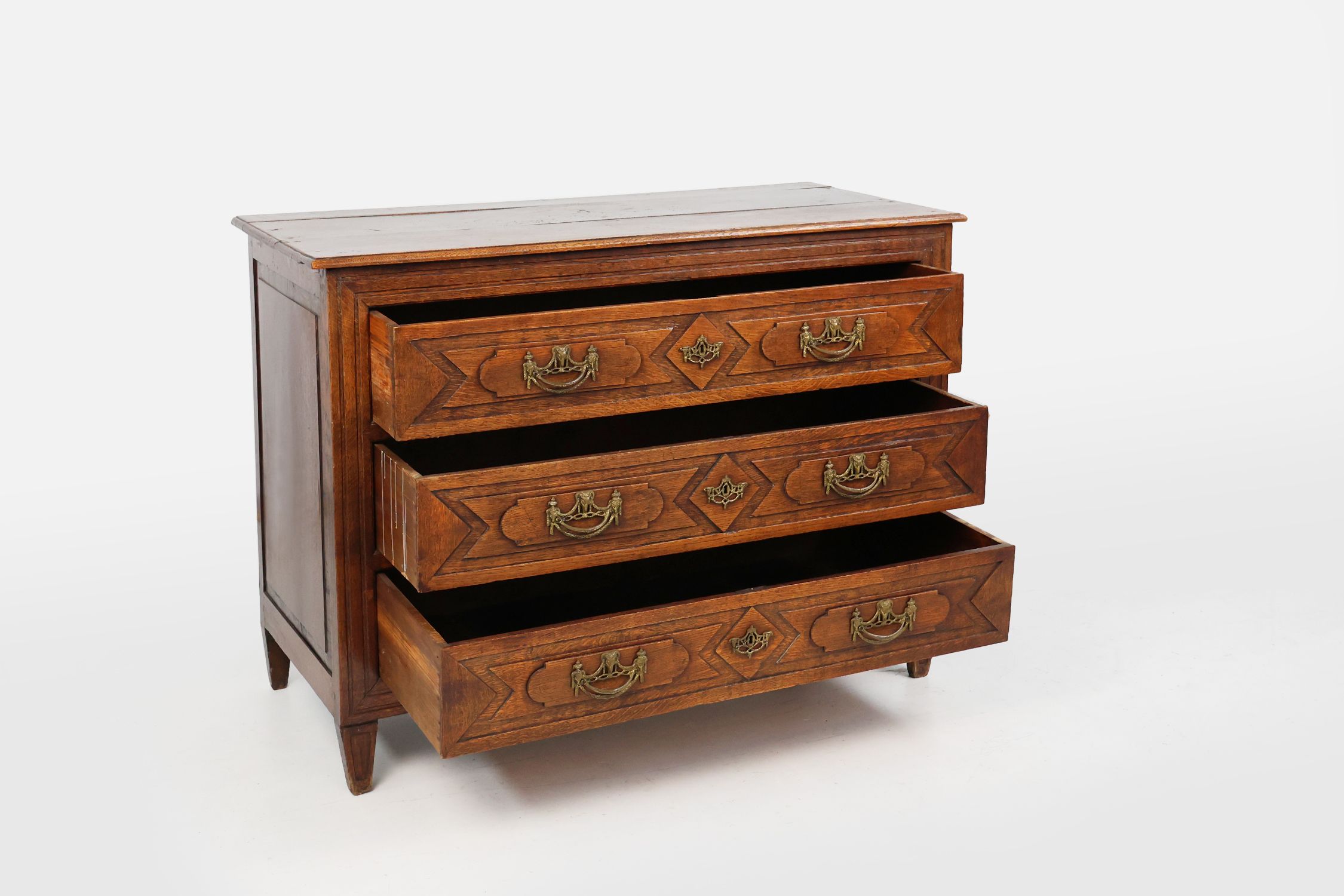 Antique hand crafted en carved chest of drawers in oak, ca. 1800 thumbnail